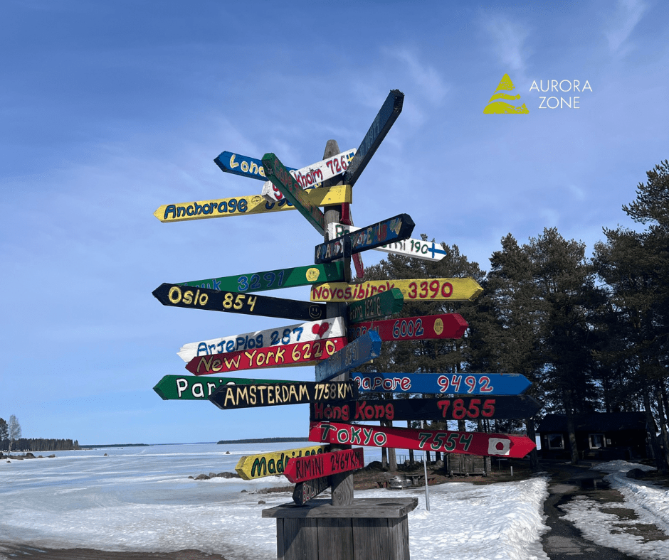 A sign post in Swedish Lapland showing the distance to other locations such as Amsterdam, Oslo, Tokyo and London. Each part of the sign faces the way of the location.